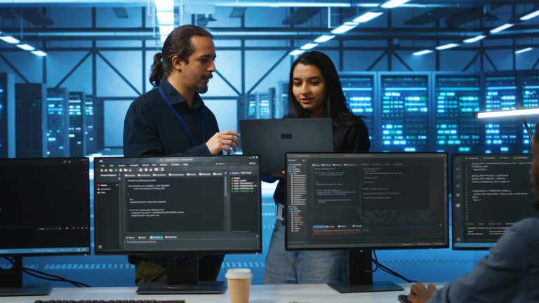Professional IT support Phoenix technician monitoring network security for Alpha Tech clients.